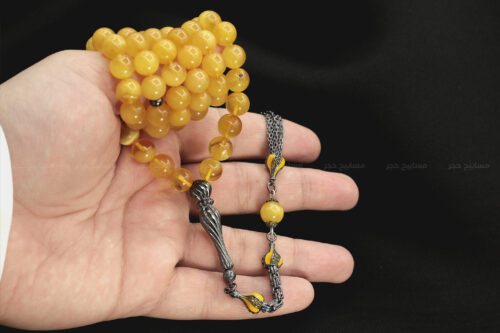 كهرم (كهرمان) طبيعي مع طقم فضة