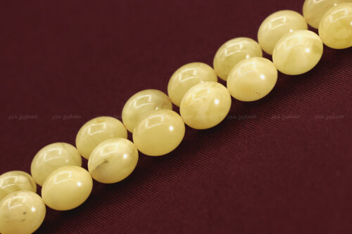 كهرم بيض حمام كركوشة جديدة برتقالي وأحمر وماروني٢ كهرم ( كهرمان ) طبيعي مع كركوشة