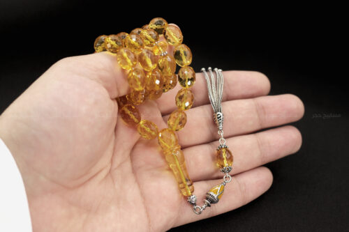 كهرم ( كهرمان ) طبيعي مع شرابة فضة