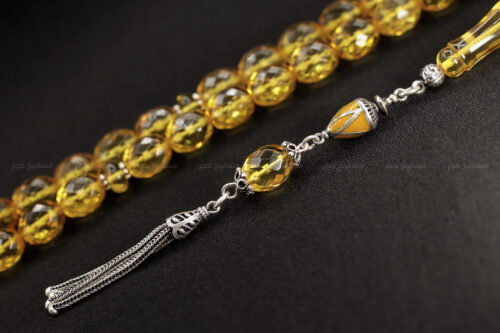 كهرم ( كهرمان ) طبيعي مع شرابة فضة