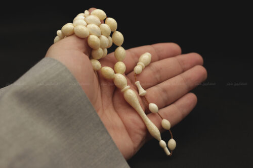 عاج حيوان الفظ ٣٣ خرزة منمش زيتوني ٤ عاج حيوان الفظ (منمش بالكامل)