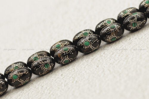 يسر (مرجان أسود) مطعم بالفضة