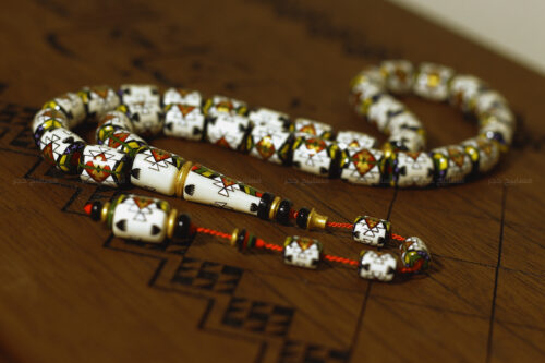 السد٤ مسباح السدو (إبداع فني على قطعة من عاج الفيل)