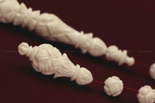 عظم جمل منقوش بالكامل (نقشة الحصير)