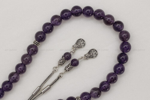 حجر الجمشت مع طقم فضة