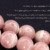 ⁨مسباح حجر الرودوكروزيت Rhodochrosite طبيعي مع شرابة فضة